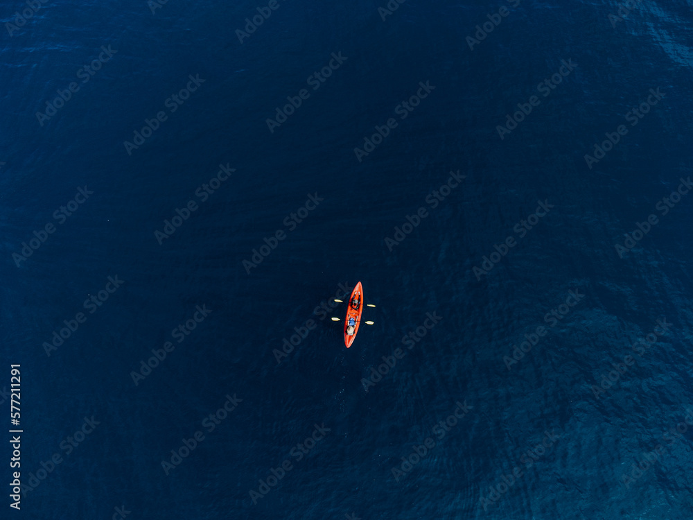 Sea kayaking excursionists in the sea Sea kayaking excursionists in the sea