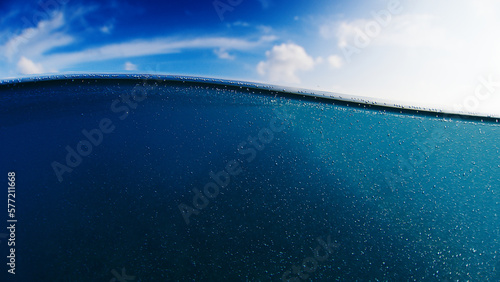 Fototapeta Naklejka Na Ścianę i Meble -  Calm sea splitted view with gentle wave, above and underwater view of the sea