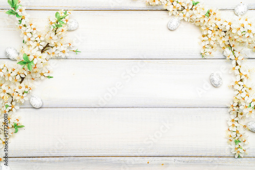 Easter eggs wood. April floral nature  white happy easter eggs on wood spring background. Easter pattern with place for text.