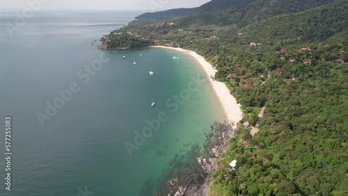Forward reveal aerial footage of Bakantiang Beach on sunny day. Ko Lanta, Krabi Province, Thailand. photo
