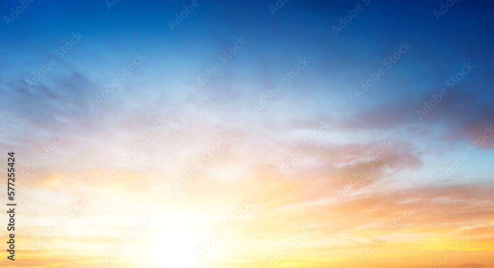 Sunset sky in the Morning with colorful orange sunrise on blue white clouds sky Background