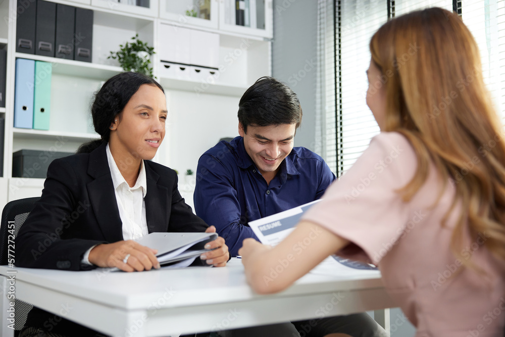 hr managers talking and interviewing female candidate applicant for a new job in the office hr managers talking and interviewing female candidate applicant for a new job in the office
