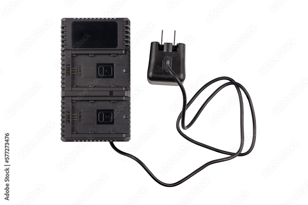 Dual charger adapter for camera battery isolated on white background. Dual charger adapter for camera battery isolated on white background.