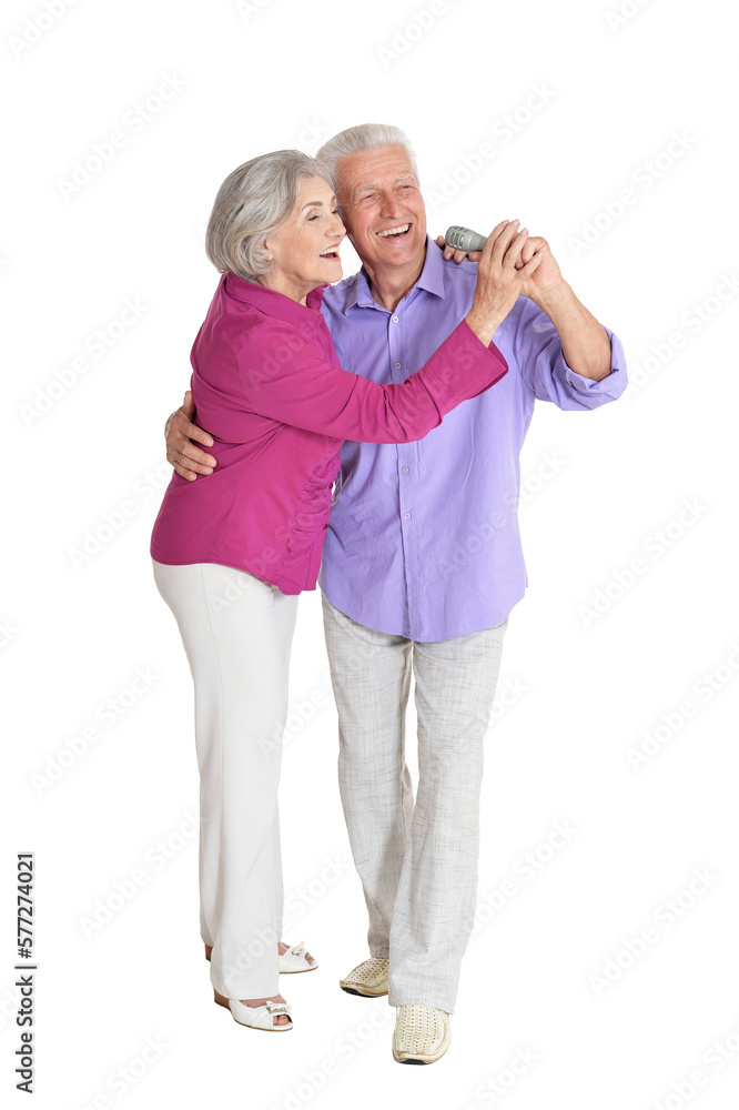 portrait of Senior couple singing with microphone portrait of Senior couple singing with microphone