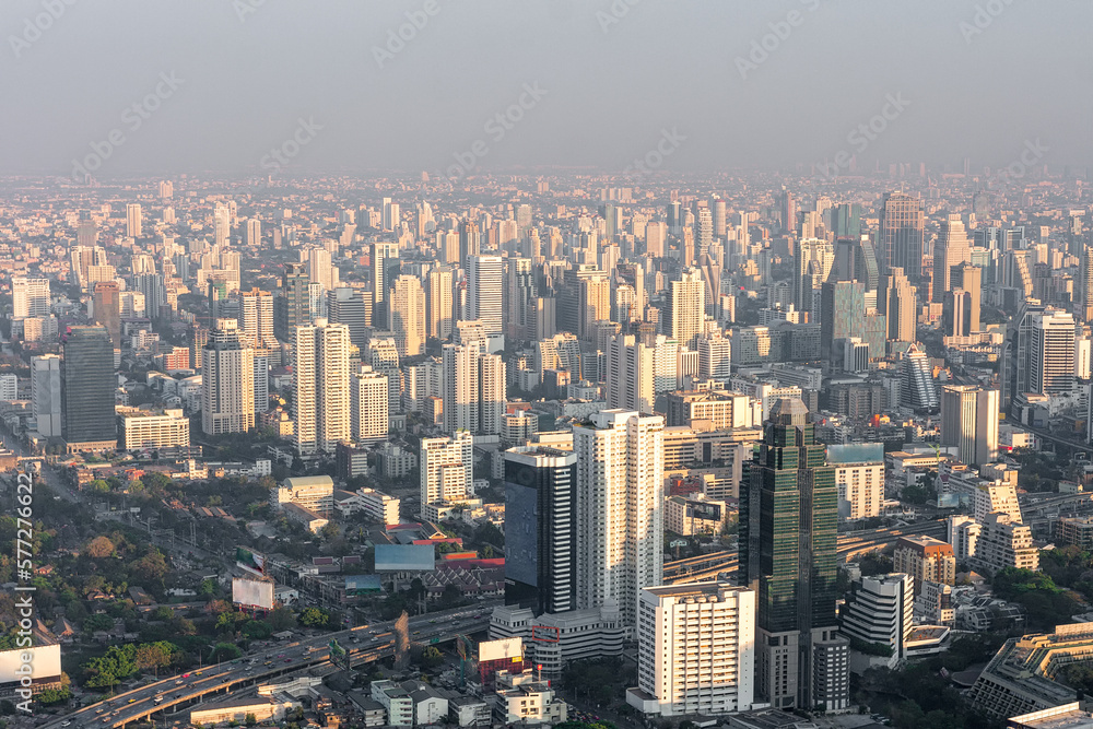 Bad air pollution in City. PM 2.5 dust in Bangkok or center city, Capital city are covered by heavy smog, Misty morning and sunrise in downtown with bad air pollution, Place to risk of cancer,Thailand