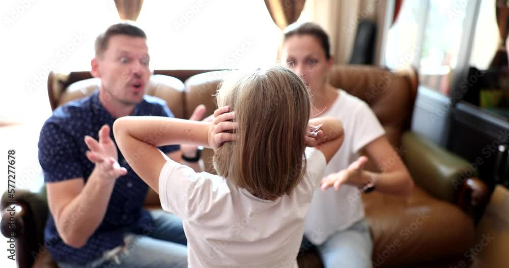 Mother and father yell at little daughter and scold Mother and father yell at little daughter and scold