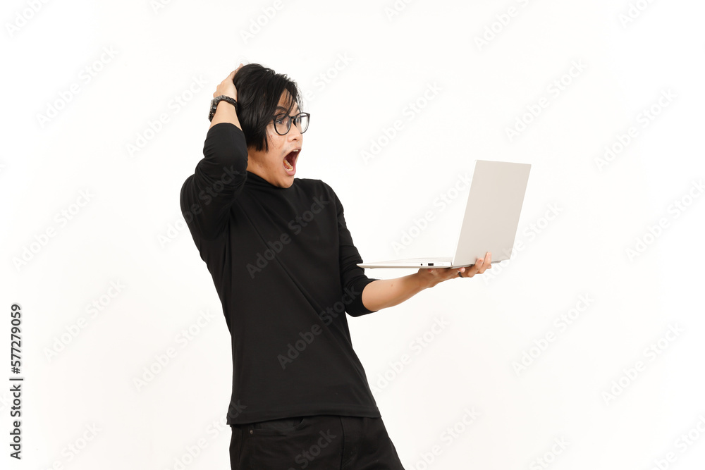 Shock and Angry While Using Laptop Of Handsome Asian Man Isolated On White Background