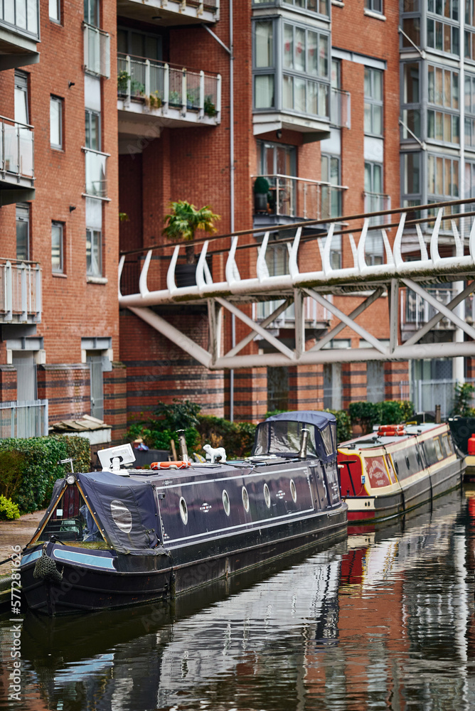 Orange house boat, Birmingham canals, housing estate