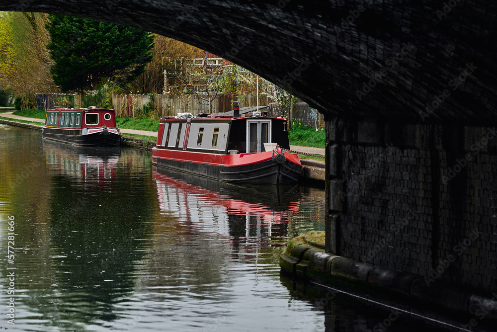 Colorful boats, houses on the water in the canals of Birmingham