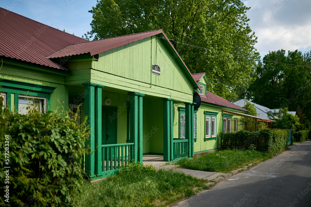 Green wooden house of Osiedle