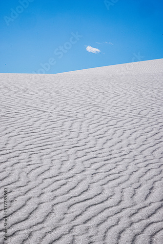 Sand dune and blue sky and one cloud, White Sands New Mexico