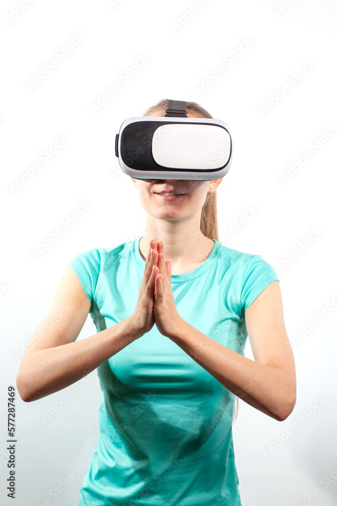 Girl in virtual reality glasses watching surprised shocking video. Young woman looking at futuristic social network map concept Girl in virtual reality glasses watching surprised shocking video. Young woman looking at futuristic social network map concept