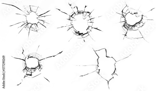 Bullet holes and cracks on white glass background
