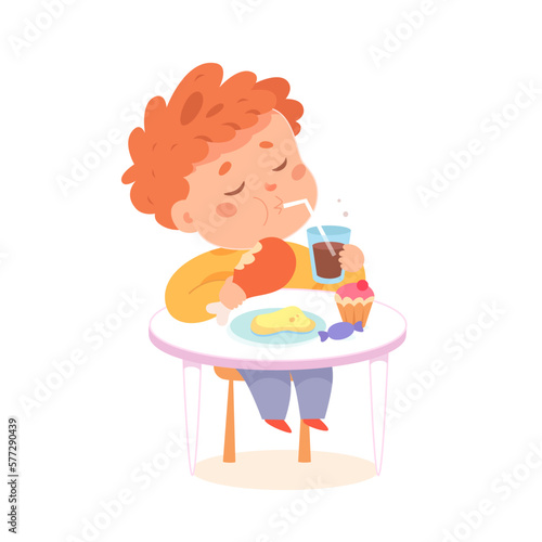 Boy eating in fast food cafe, hungry kid sitting at table of cafeteria with chicken leg