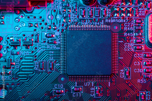 Digital Microprocessor. Computer Controller Circuit Board closeup Main Central Processing Unit Electronic Chips with Data Signal Lane. photo