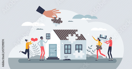 Volunteers working together to achieve common target tiny person concept. House assembly from donated materials for poor family vector illustration. Home construction with volunteering support crowd.