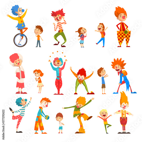 Friendly funny clowns in classic outfit performing tricks and entertaining kids at Birthday or carnival party vector