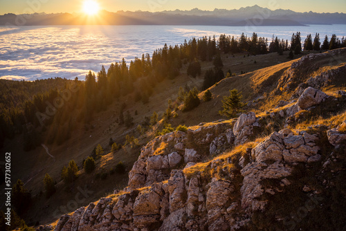 Sunrise over the alps and Lake Geneva basin, on a foggy day