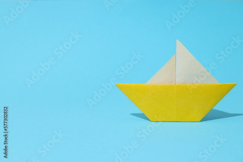 Concept of travel and adventure with paper boat