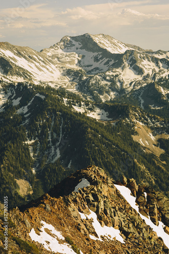 The Wasatch Mountains over Snowbird retain snow during the early summer.