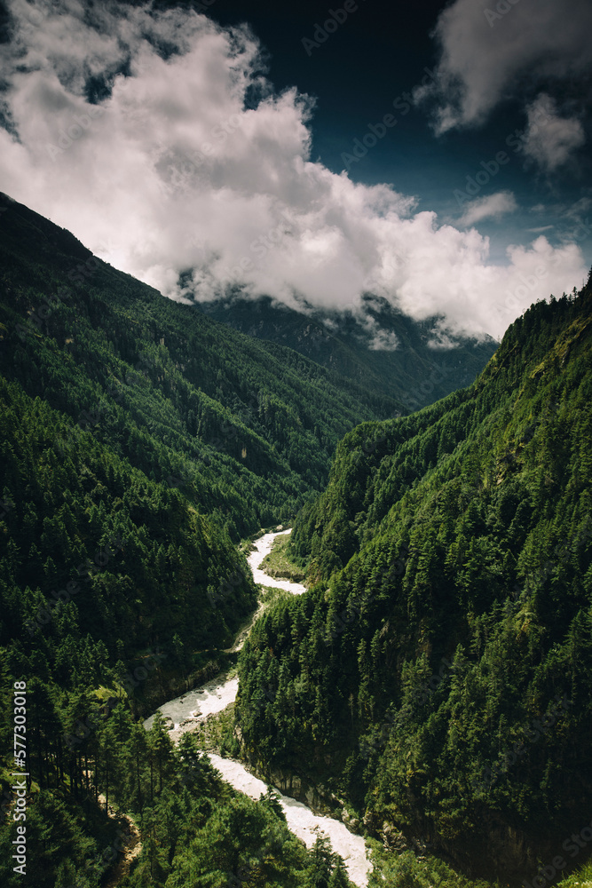 The mountains of the Everest Region are wrapped in clouds in monsoon season. The mountains of the Everest Region are wrapped in clouds in monsoon season.