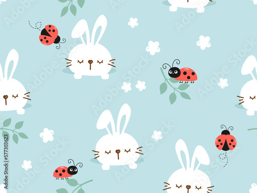 Seamless pattern with sleeping bunny rabbit in the hole, daisy flower, leaves and lady bugs on blue background vector illustration. Cute childish print. © Thanawat