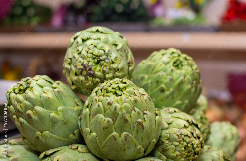 A bowl of artichokes with the word artichoke on it A bowl of artichokes with the word artichoke on it
