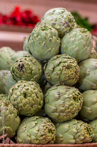 A bowl of artichokes with the word artichoke on it