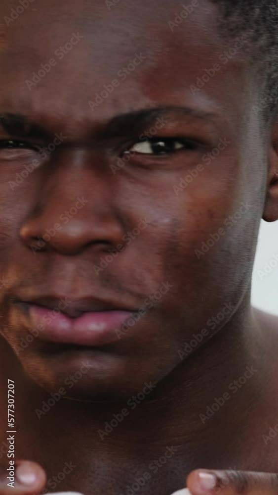 Vertical video. Face irritation. Skin problem. Acne treatment. Closeup of annoyed dissatisfied man applying toner cleanser with cotton pads. Vertical video. Face irritation. Skin problem. Acne treatment. Closeup of annoyed dissatisfied man applying toner cleanser with cotton pads.