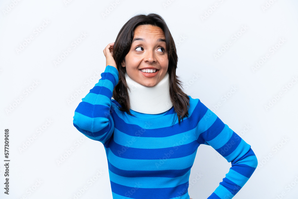 Young hispanic woman wearing neck brace isolated on white background thinking an idea Young hispanic woman wearing neck brace isolated on white background thinking an idea