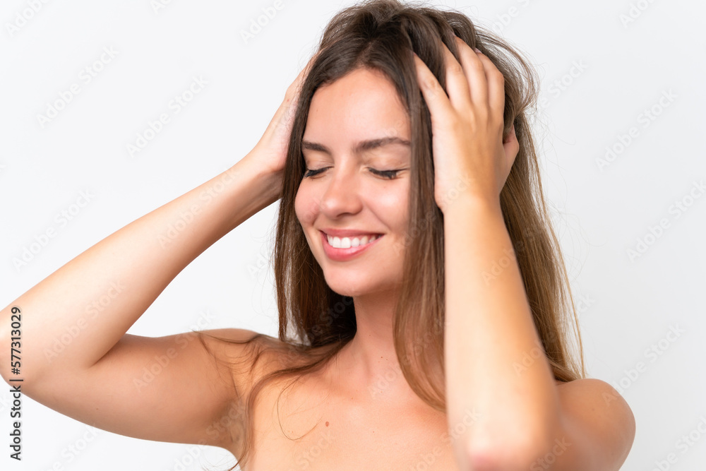 Young caucasian woman isolated on white background touching her hair. Close up portrait