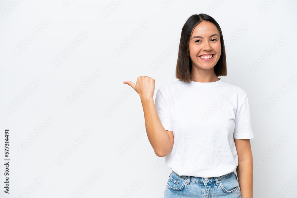 Young caucasian woman isolated on white background pointing to the side to present a product Young caucasian woman isolated on white background pointing to the side to present a product