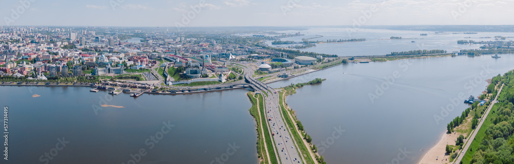 Beautiful panoramic summer picture of Kazan kremlin on the sunset, Tatarstan, Russia. Capital of the Republic of Tatarstan. Buildings and landmark line with sunny weather. Panorama of the sights.