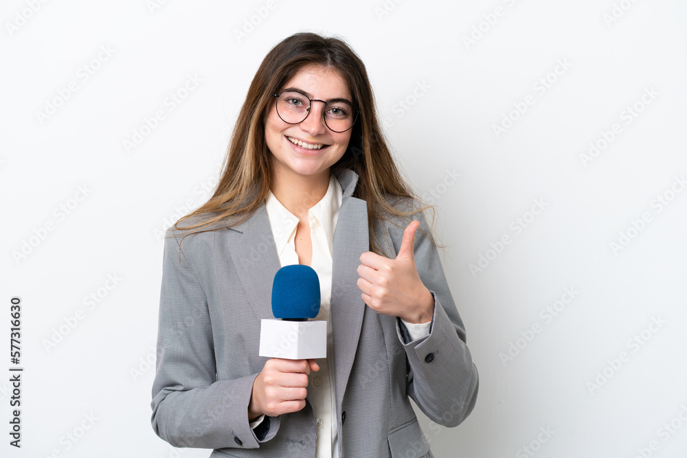 Young caucasian TV presenter woman isolated on white background giving a thumbs up gesture Young caucasian TV presenter woman isolated on white background giving a thumbs up gesture
