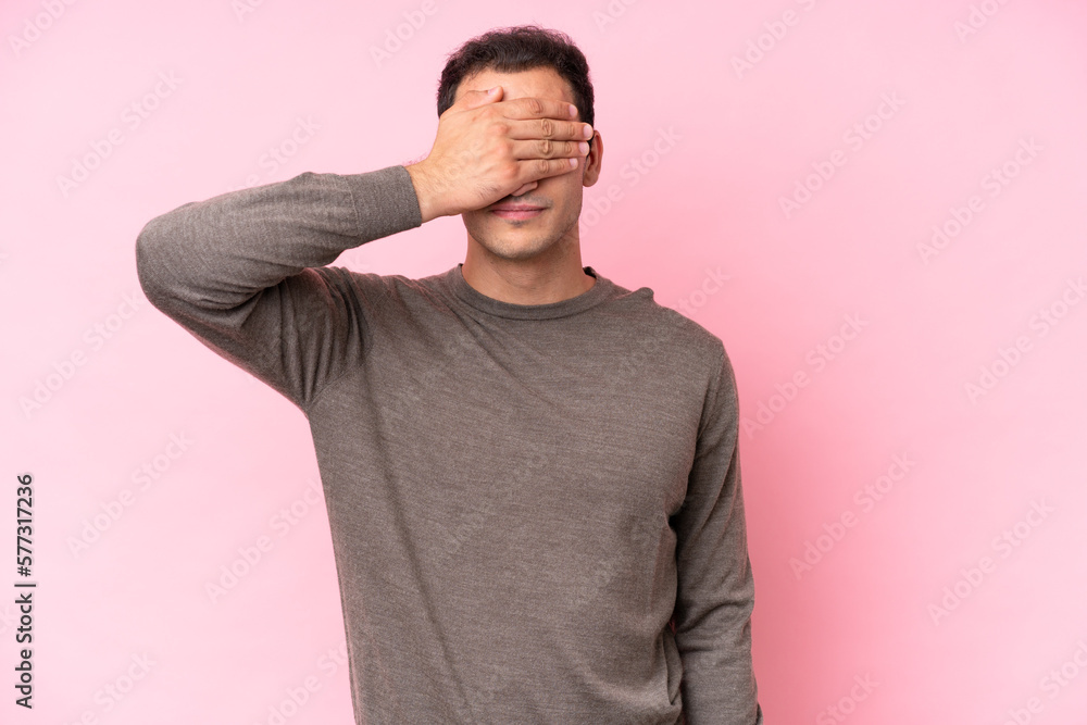 Young caucasian man isolated on pink background covering eyes by hands. Do not want to see something Young caucasian man isolated on pink background covering eyes by hands. Do not want to see something