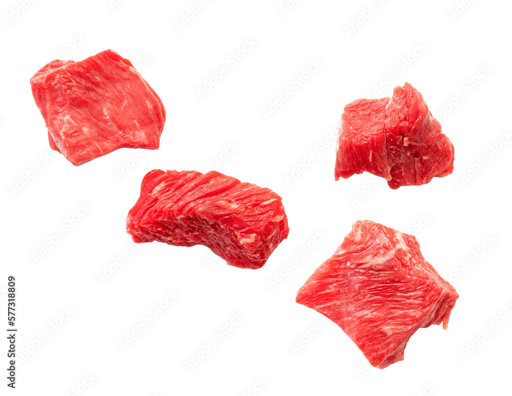 Pieces of raw beef meat falling and isolated on white. Slices of cutted red meat