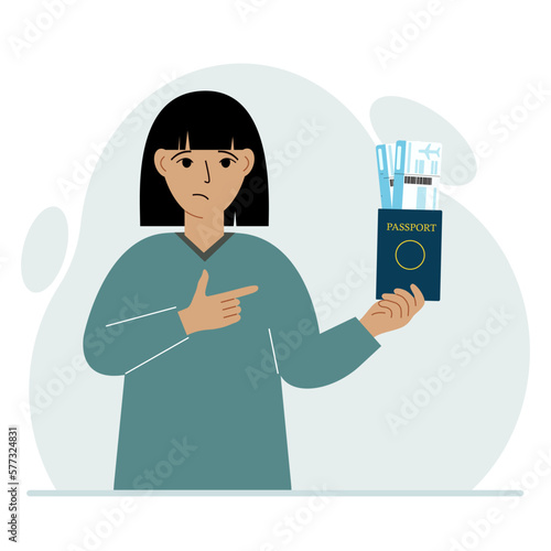 A woman holds a passport with air tickets. The woman shows the boarding pass. Travel concept.