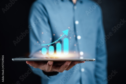 Businessman showing business chart growth target planning development leadership and customer target group  investment growth and success development  achivement  goal  strategy  finance concept.