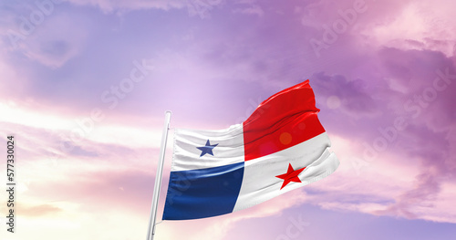 Waving Flag of Panama in Blue Sky. The symbol of the state on wavy cotton fabric.