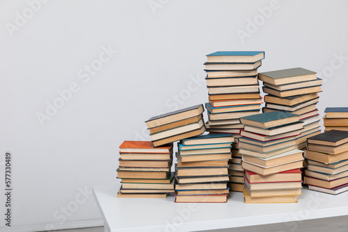many books stacked in the library on a white background science knowledge reading