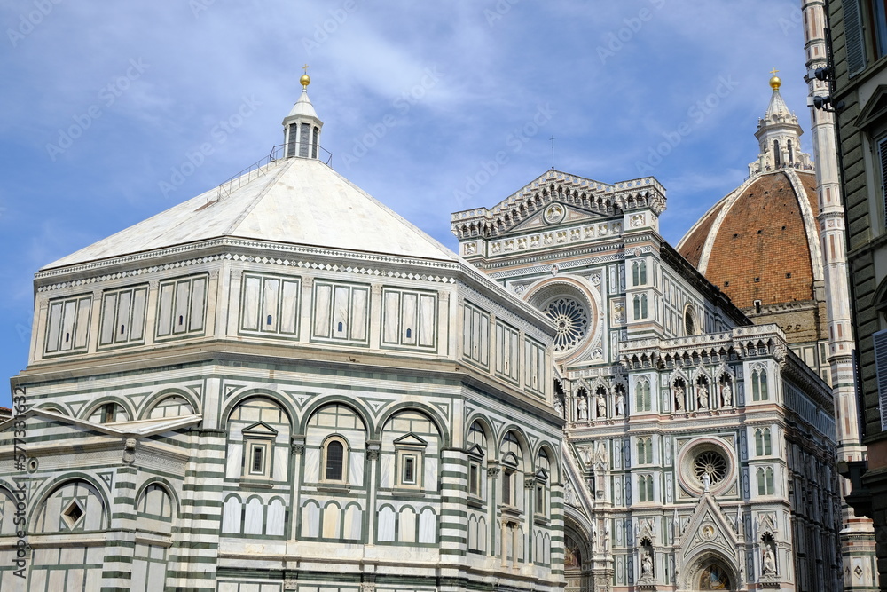 Florence cathedral. Cathedral square in Florence.Santa Maria del Fiore baptistery with blue sky. 