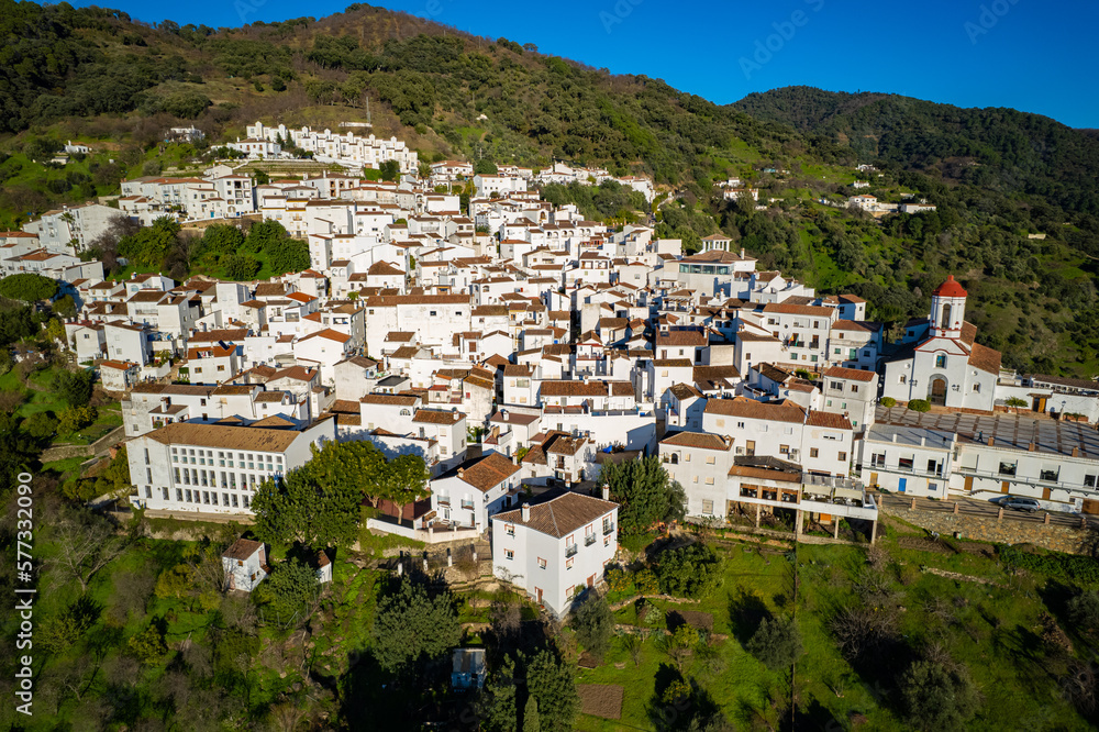 Aerial view above the beautiful white village of Genalguacil in Andalusia Spain