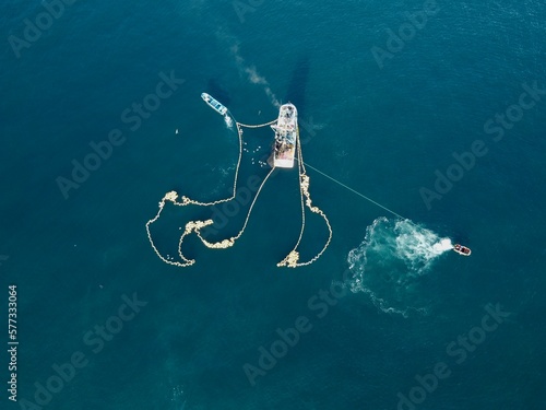 Ship Loaded With Tuna Performs Fish Extraction Maneuvers At Sea © Carlos