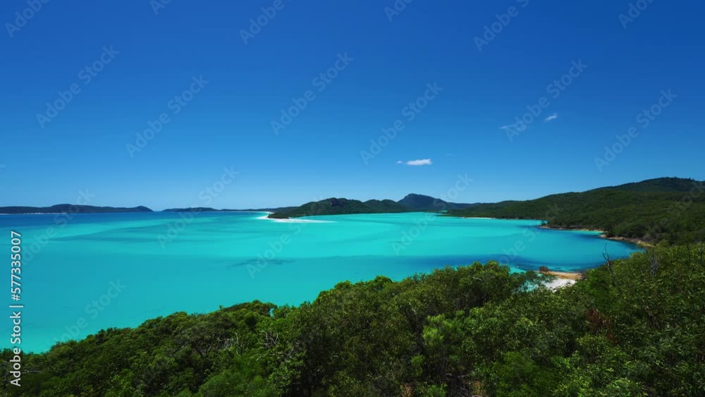 Whitsunday Island Whitehaven Beach view of Hill Inlet with clear turquoise blue water at famous filming location in South Pacific Queensland Australia, at Great Barrier Reef. Tropical paradise tourism Whitsunday Island Whitehaven Beach view of Hill Inlet with clear turquoise blue water at famous filming location in South Pacific Queensland Australia, at Great Barrier Reef. Tropical paradise tourism