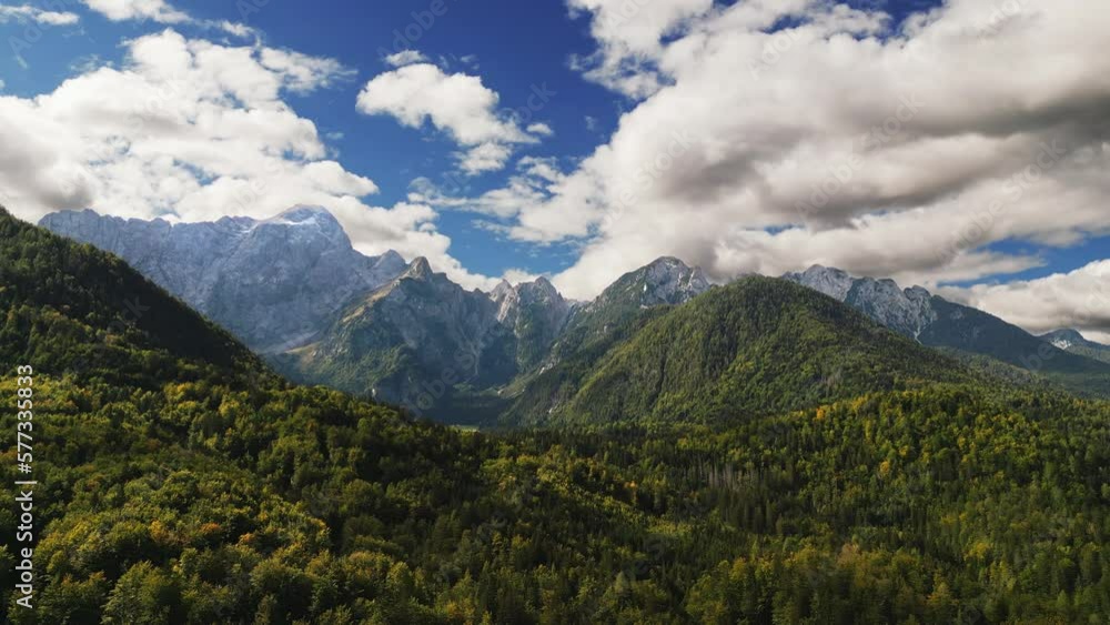 Beautiful Grand Mountains Valley Italy, Julian Alps, Aerial Drone Dolly, Sunny Green Trees, Blue Sky With Clouds, Idyllic Travel Destination Tourism, Vacation Location Beautiful Grand Mountains Valley Italy, Julian Alps, Aerial Drone Dolly, Sunny Green Trees, Blue Sky With Clouds, Idyllic Travel Destination Tourism, Vacation Location