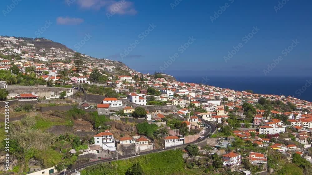 Aerial view from the mountain over the rooftops from cable car on Madeira timelapse hyperlapse. Island landscape. Funchal, Portugal. Aerial view from the mountain over the rooftops from cable car on Madeira timelapse hyperlapse. Island landscape. Funchal, Portugal.
