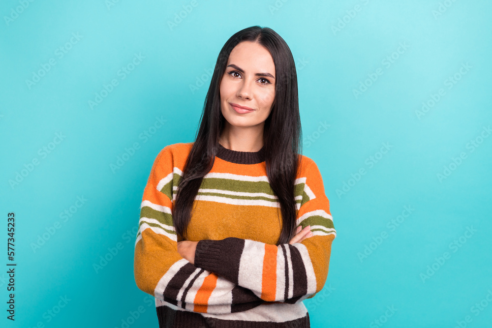 Fototapeta premium Portrait of young serious confident business lady casual trendy striped sweater professional seo company worker isolated on cyan color background