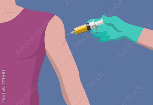 doctor in gloves holding syringe and making injection to patient