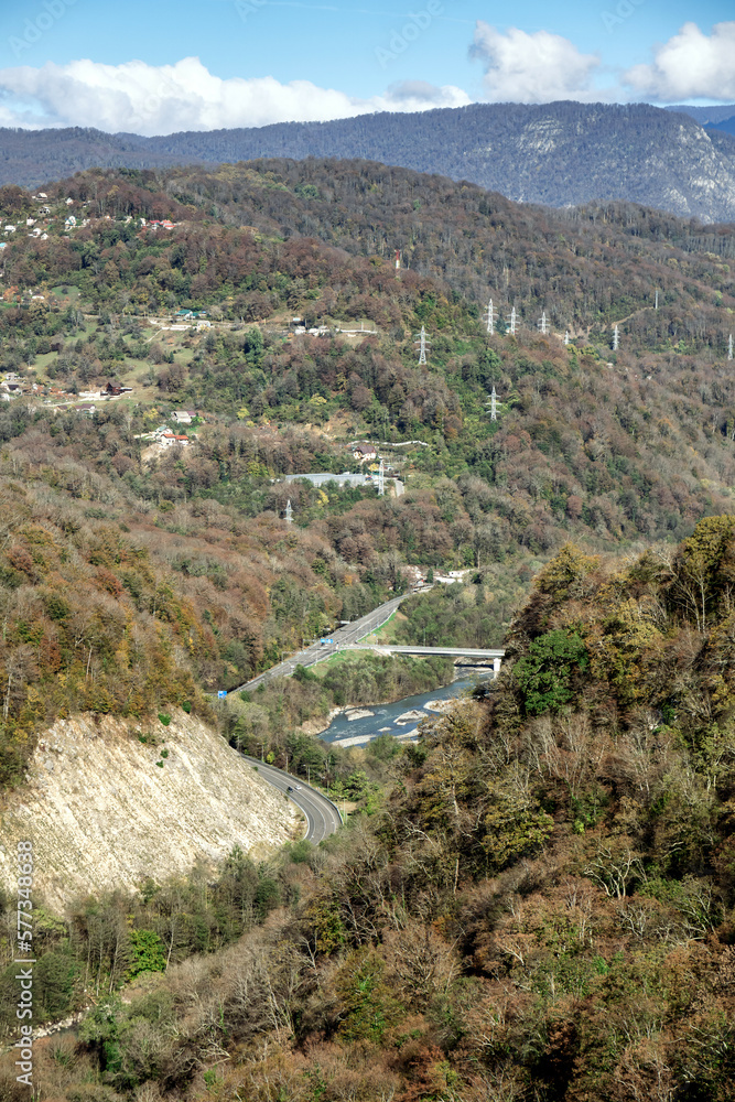view of the valley of the Mzymta river with built structures in Adler