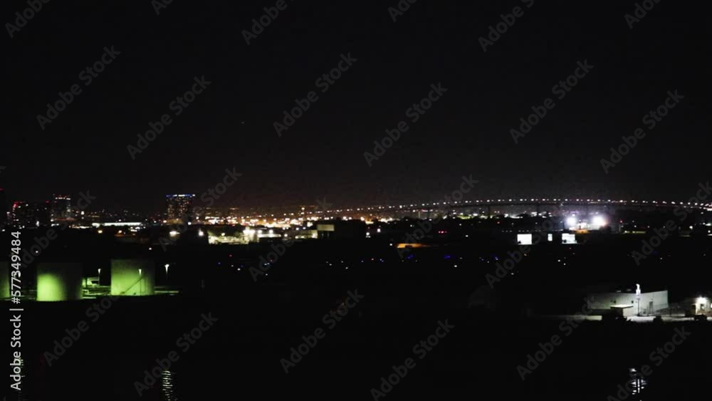 Aerial view of Coronado bridge and downtown San Diego lit up at night Aerial view of Coronado bridge and downtown San Diego lit up at night